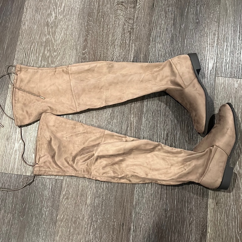 Never wore tall flat boots
